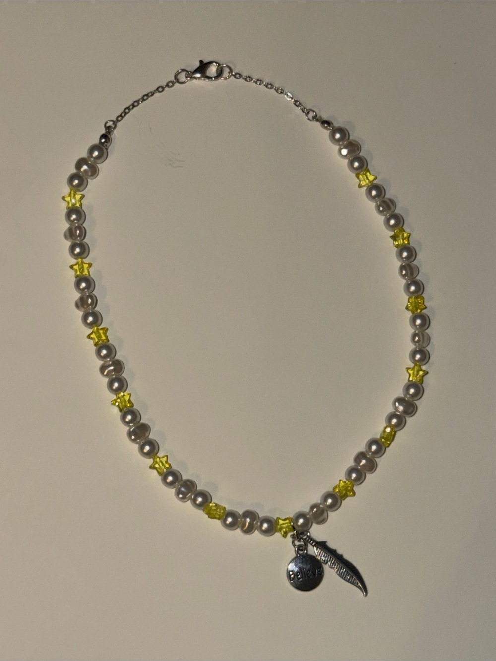 Handmade Pearl Bead Choker Necklace with Yellow Star Accents and Silver Charms